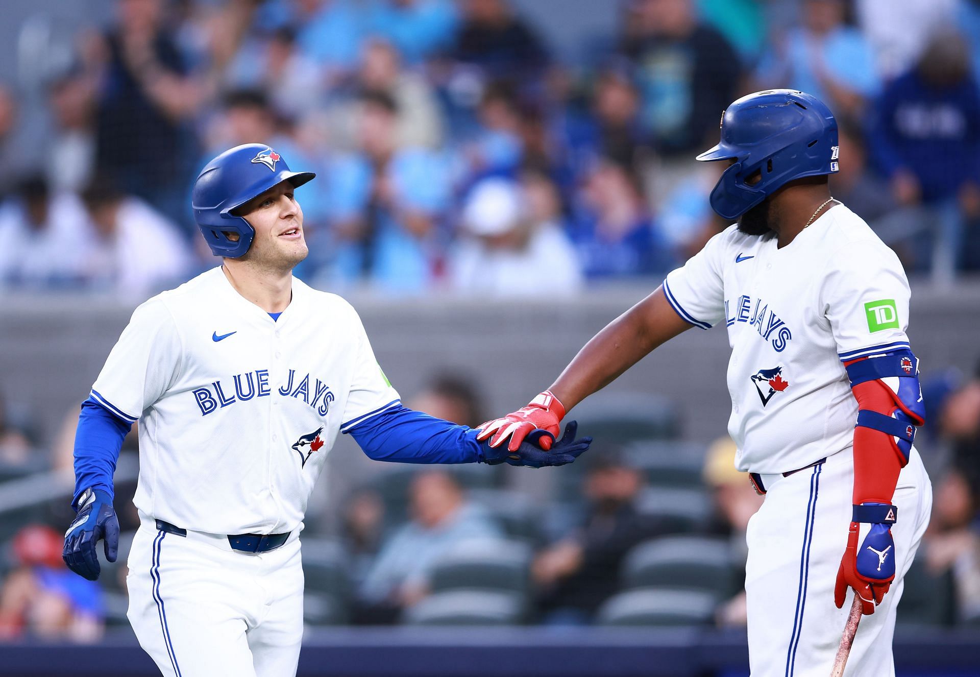 Daulton Varsho alongside Vladimir Guerrero Jr. during a game against the Philadelphia Phillies - Source: Getty